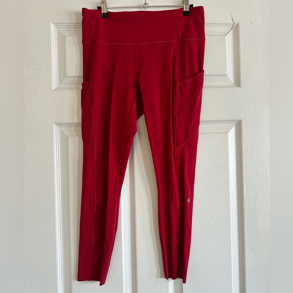 Women’s Wunder Train High-Rise Tight with Pockets 25” Red, size 10.